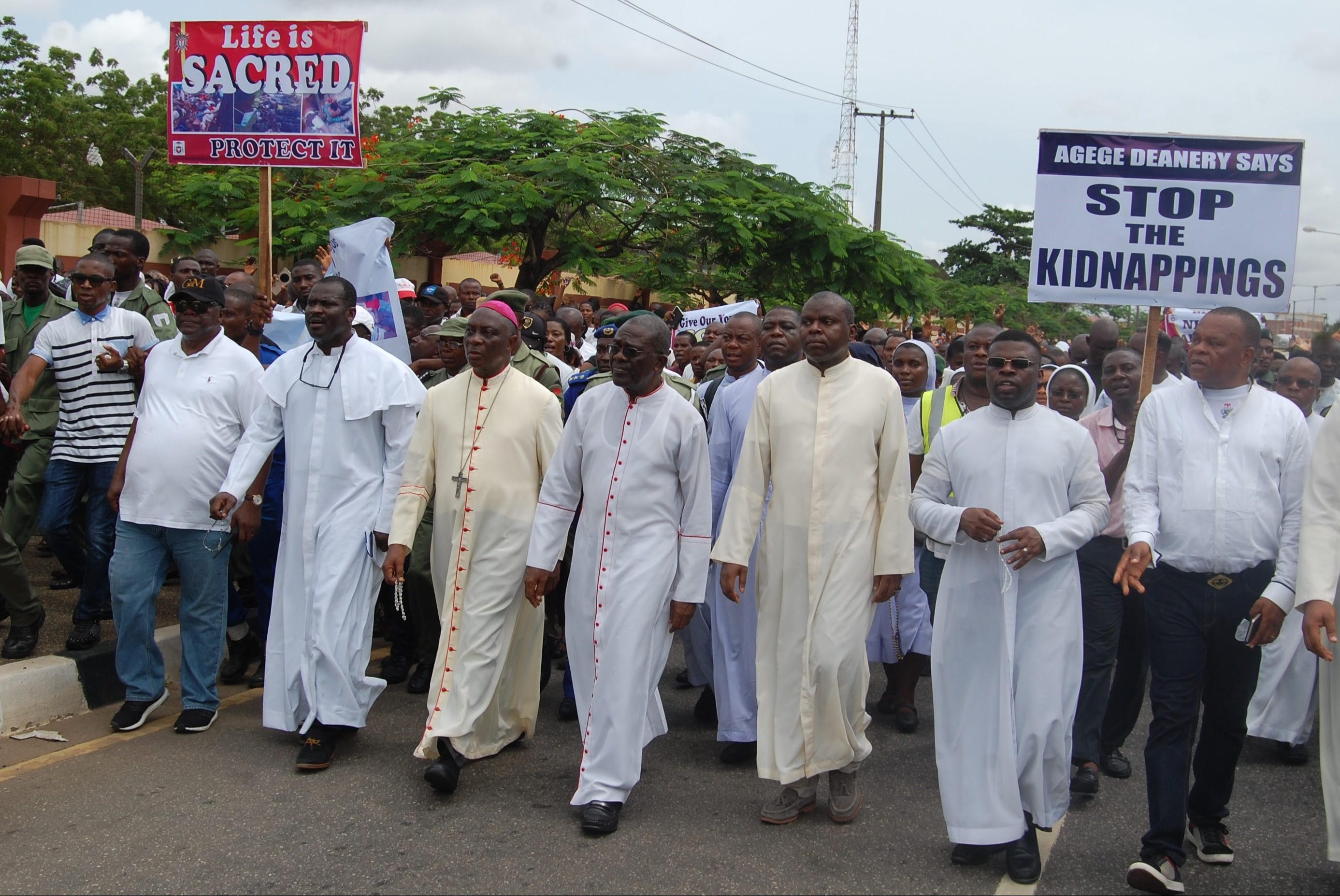 PHOTOS OF THE DAY: Funeral mass for slain priests, others as Catholics protest