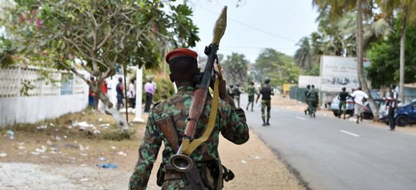 Soldiers burn military base, loot armoury