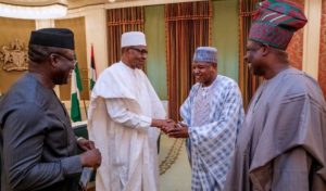 PHOTOS OF THE DAY: Fayemi presents Certificate of Return to Buhari