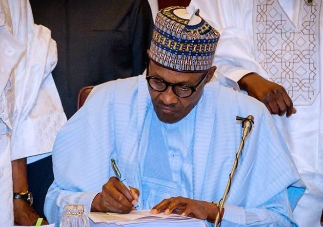 Buhari signs instrument of accession to International Cocoa Agreement