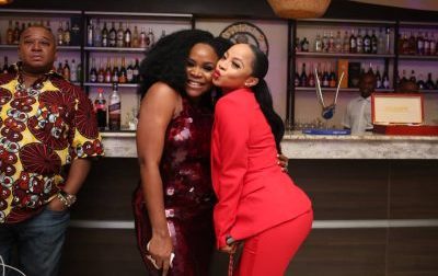Toke Storms Omawumi’s Exclusive Listening Party in Hot Red Attire