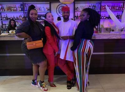 Toke Storms Omawumi’s Exclusive Listening Party in Hot Red Attire