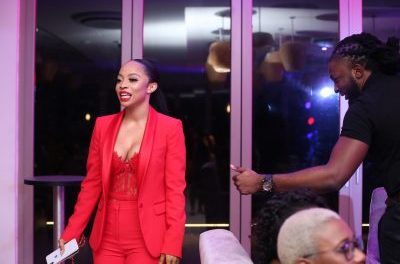 Toke Storms Omawumi Exclusive Listening Party in Hot Red Attire
