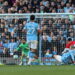 Man City beat Arsenal 2-1 to close gap at Premier League summit